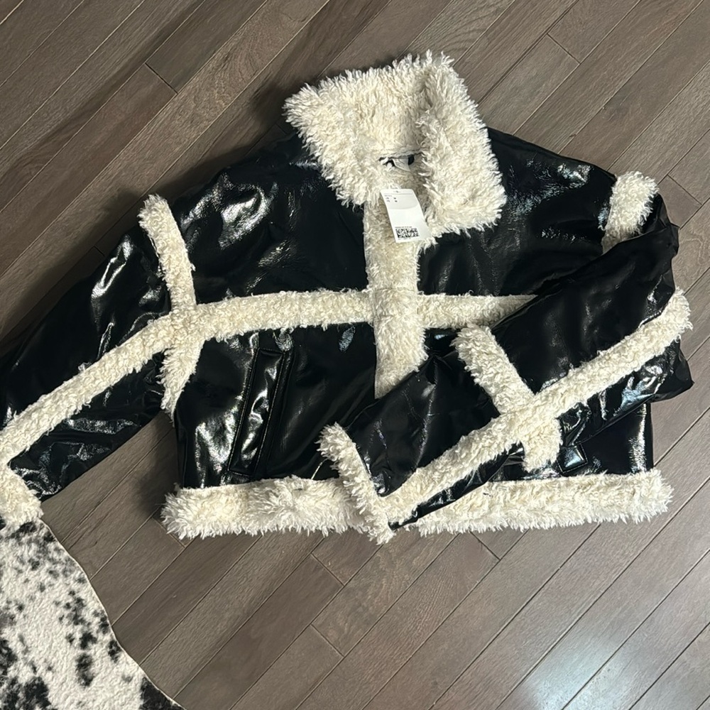 Shiny black and white cropped jacket